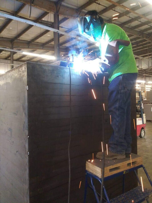 A welder welding